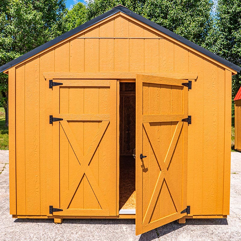 The utility Shed with it's front door slightly open.