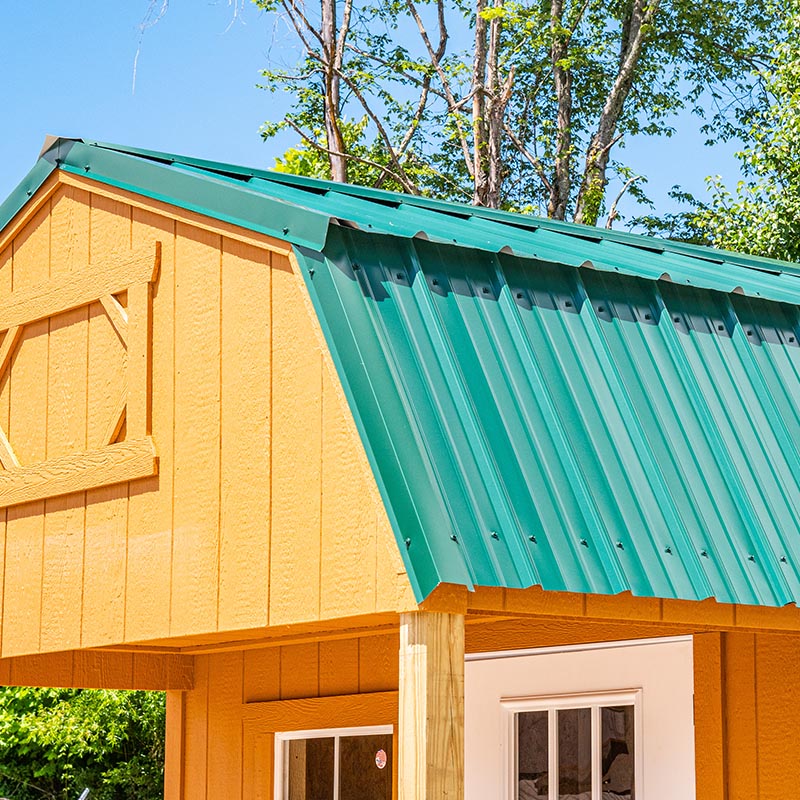 A green metal roof on one of our sheds.